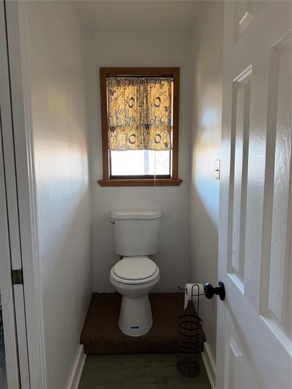 263 Highway 154 Ringgold, LA 71068 - Photo 24 of 38 Bathroom with toilet and light wood-type flooring