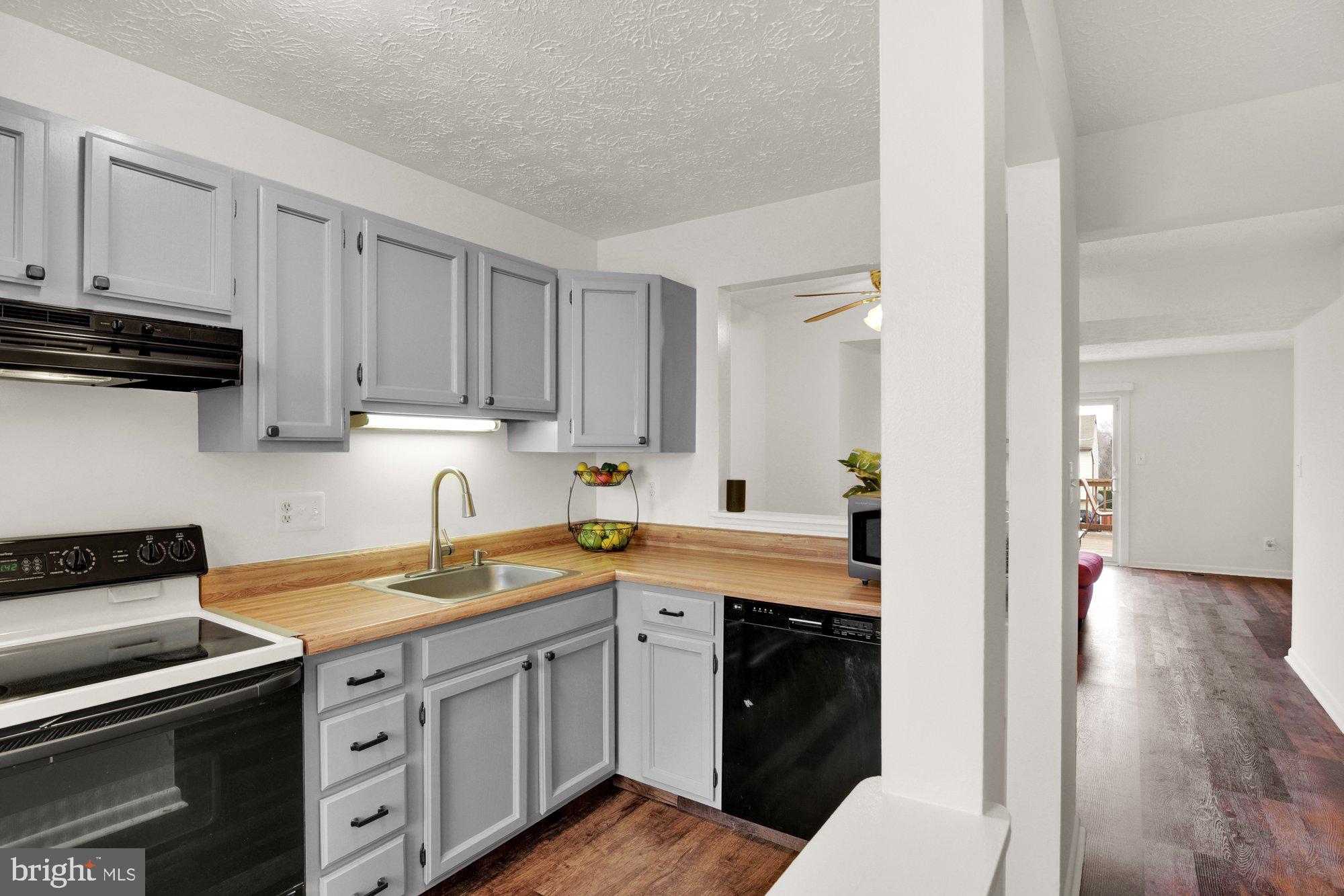 805 West Spring Meadow Court Edgewood, MD 21040 - Photo 6 of 21 Kitchen into dining and living room