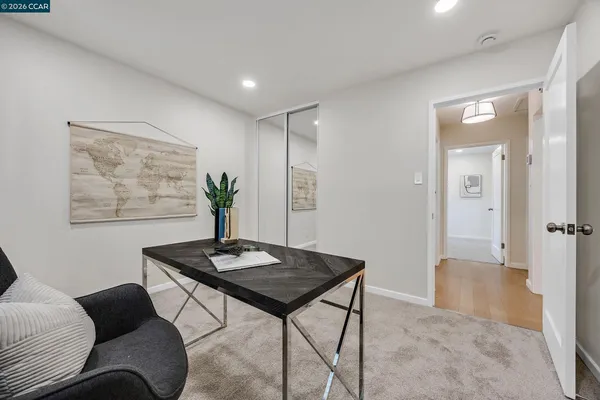 a view of a livingroom with furniture and wooden floor