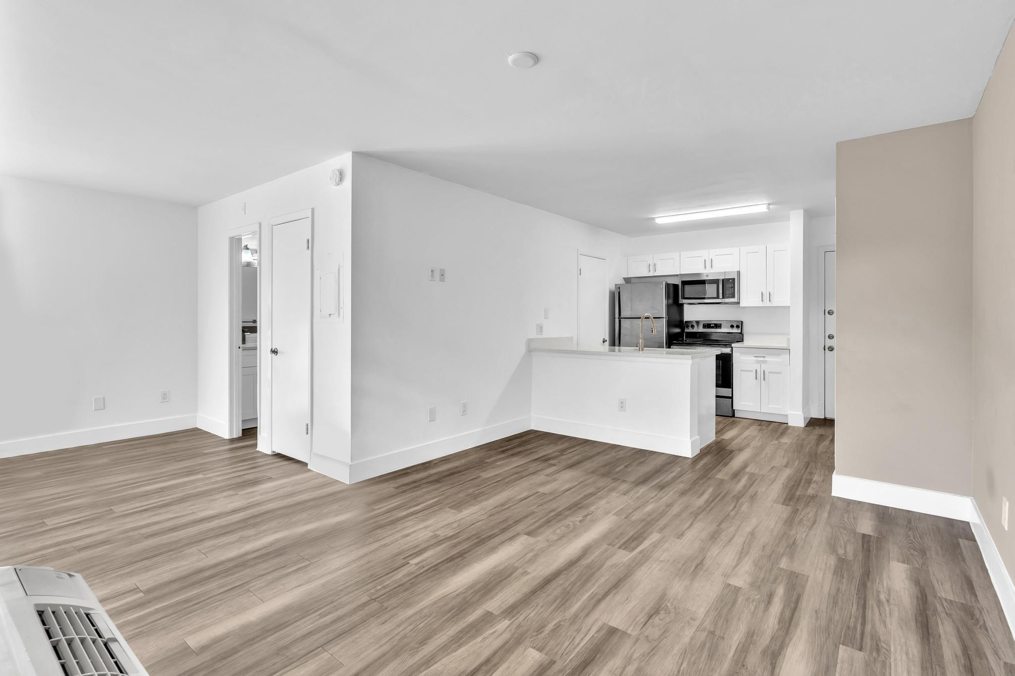 4481 West McNab Road, Unit 28 Pompano Beach, FL 33069 - Photo 16 of 45 a view of a kitchen with wooden floor