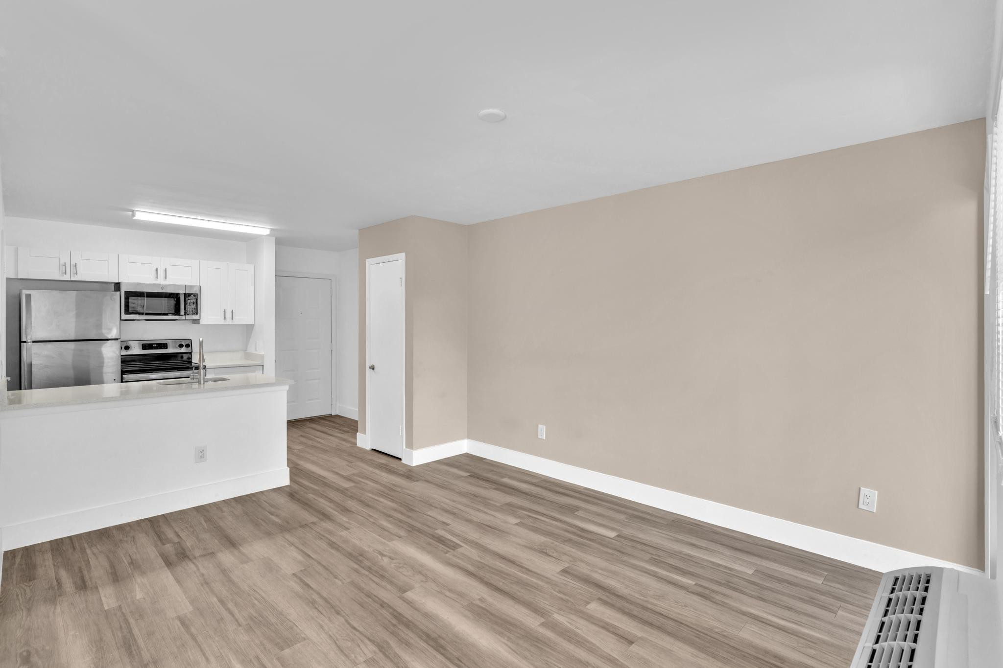 4481 West McNab Road, Unit 28 Pompano Beach, FL 33069 - Photo 18 of 45 a view of kitchen with wooden floor