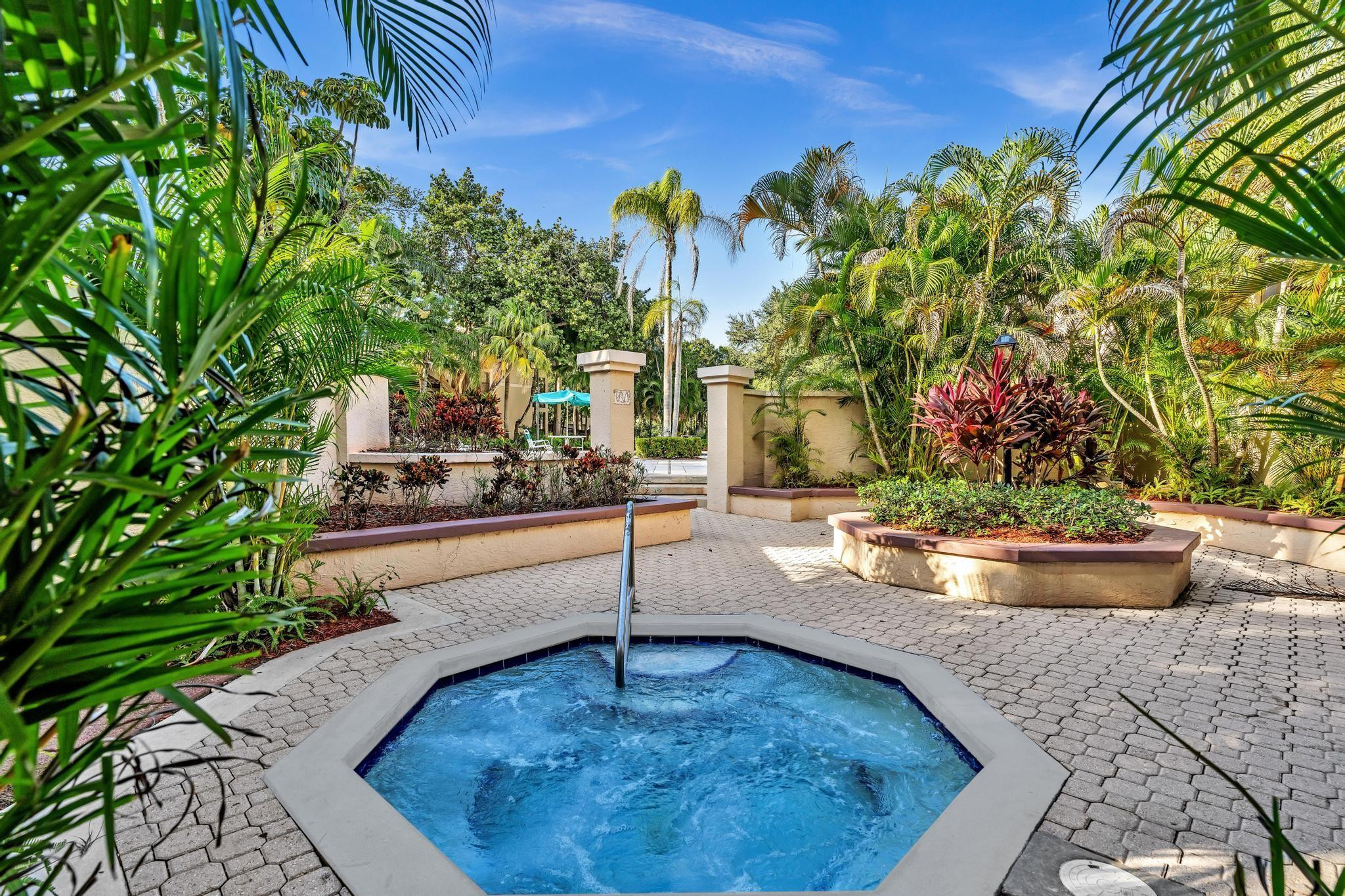 4481 West McNab Road, Unit 28 Pompano Beach, FL 33069 - Photo 31 of 45 a view of swimming pool with outdoor seating
