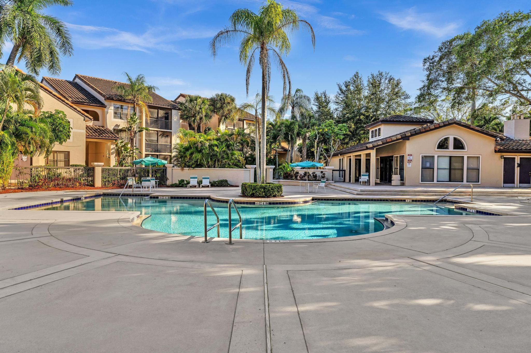 4481 West McNab Road, Unit 28 Pompano Beach, FL 33069 - Photo 33 of 45 a view of multiple houses with a street