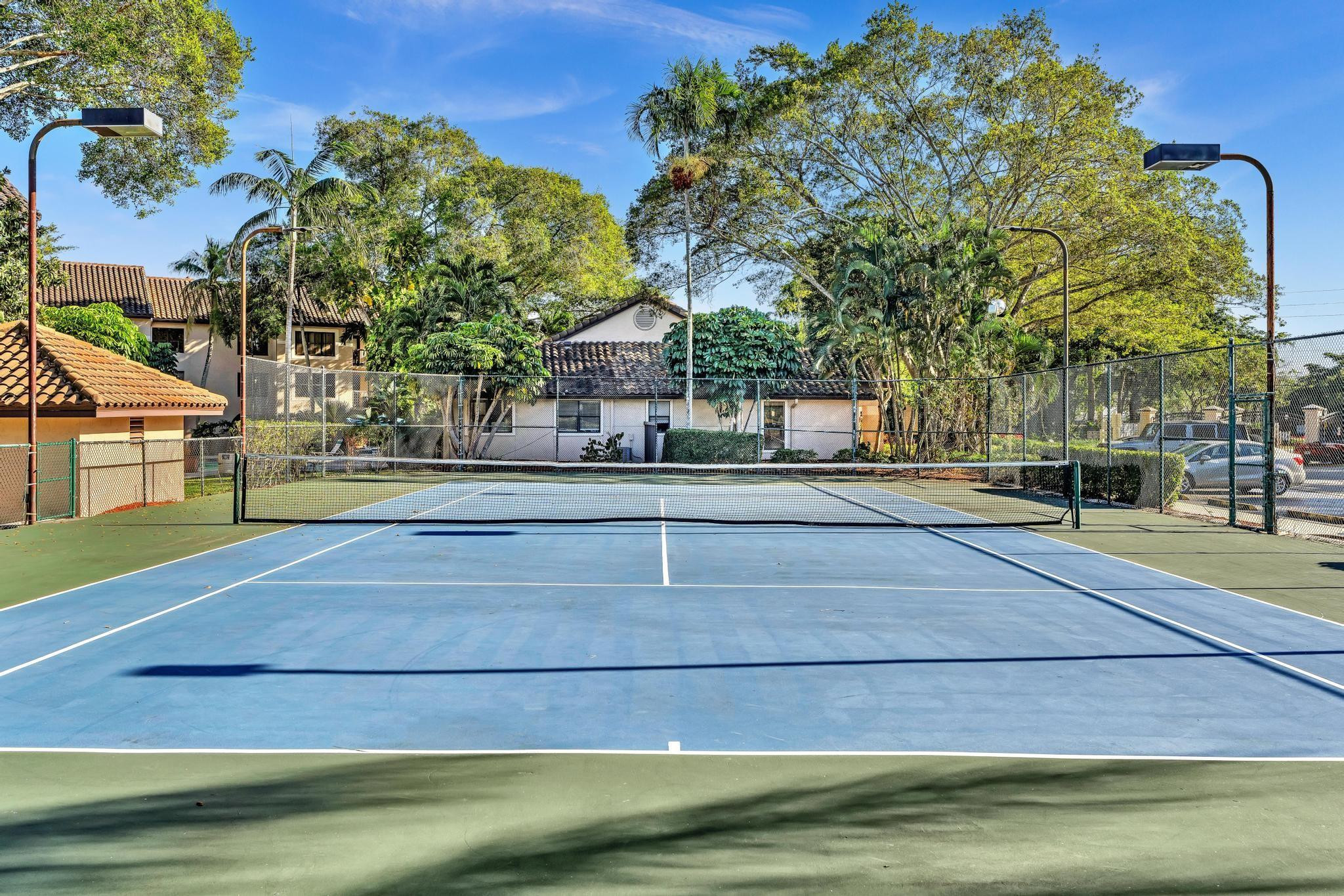 4481 West McNab Road, Unit 28 Pompano Beach, FL 33069 - Photo 35 of 45 a house view with a outdoor space