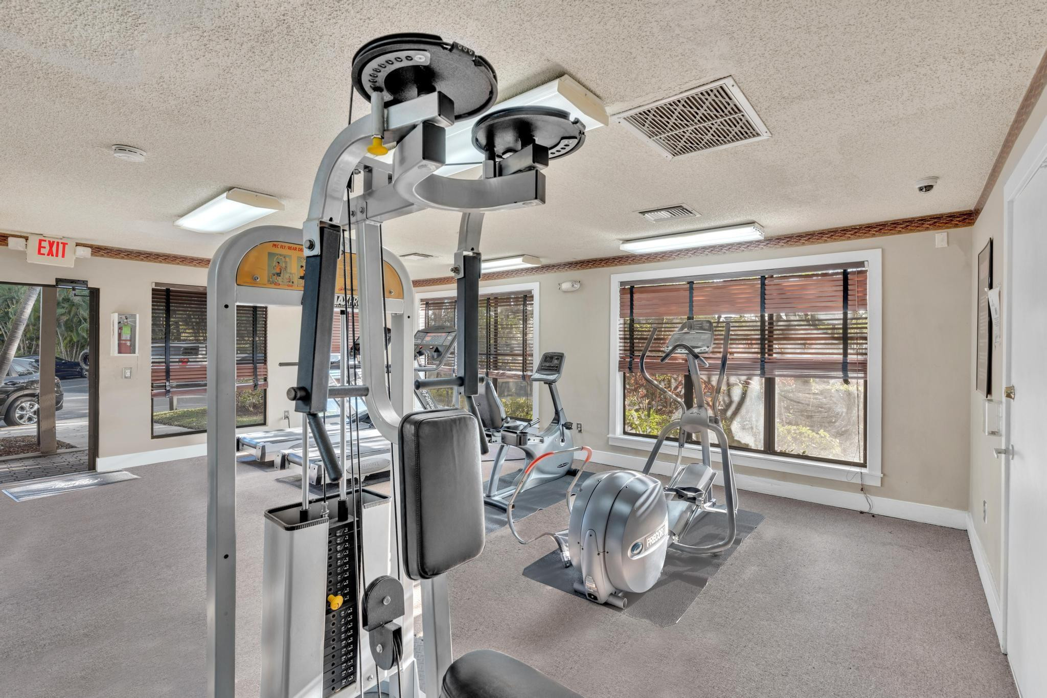 4481 West McNab Road, Unit 28 Pompano Beach, FL 33069 - Photo 38 of 45 a view of a room with gym equipment