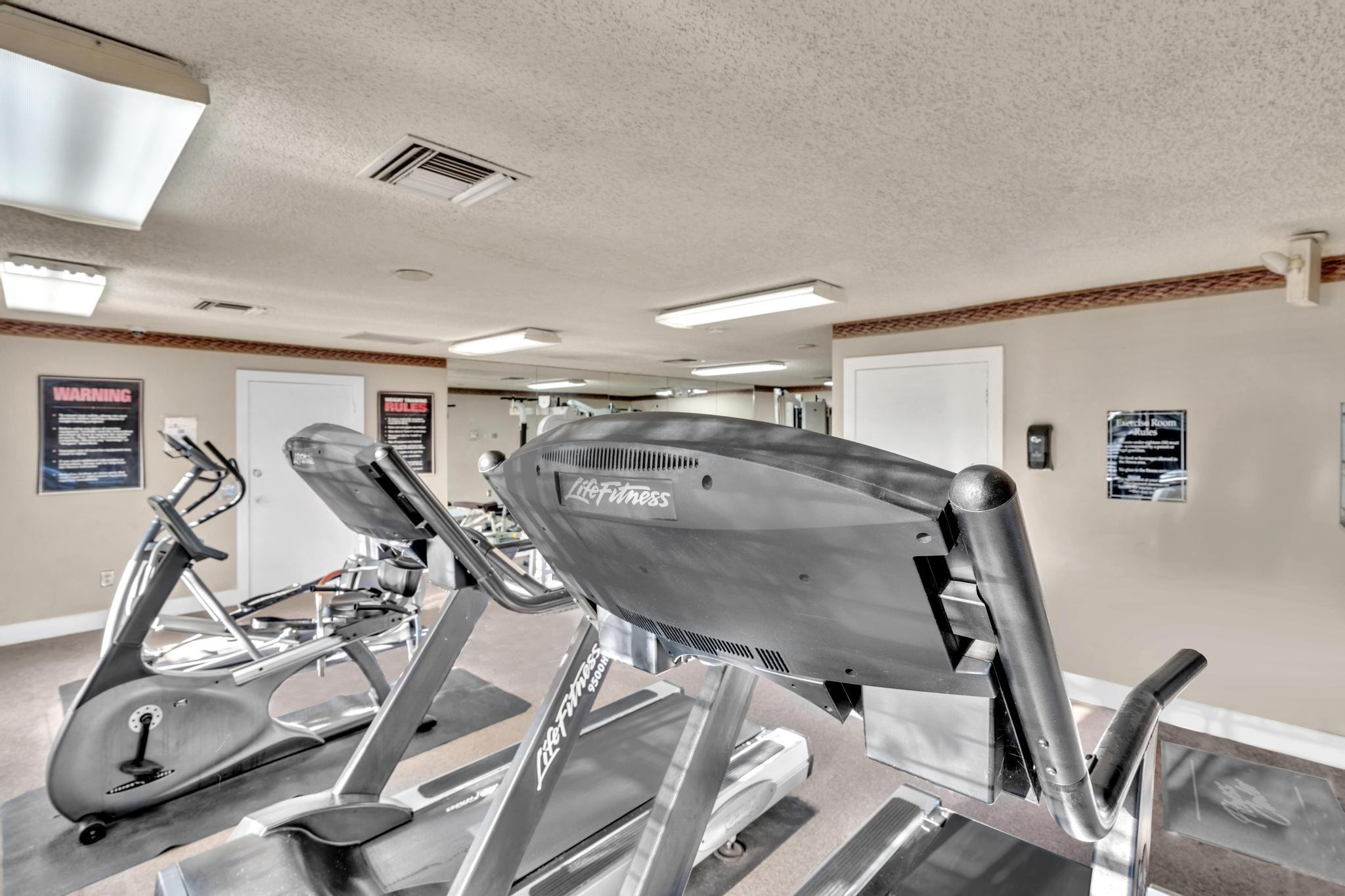 4481 West McNab Road, Unit 28 Pompano Beach, FL 33069 - Photo 39 of 45 a view of a room with gym equipment