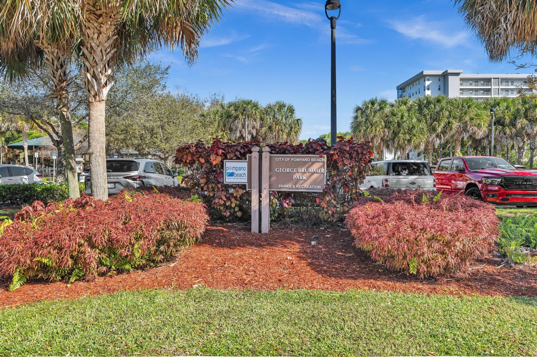 4481 West McNab Road, Unit 28 Pompano Beach, FL 33069 - Photo 40 of 45 a view of a backyard with plants and patio