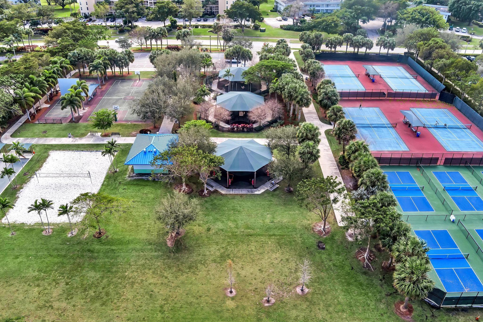 4481 West McNab Road, Unit 28 Pompano Beach, FL 33069 - Photo 43 of 45 an aerial view of residential houses with outdoor space and street view