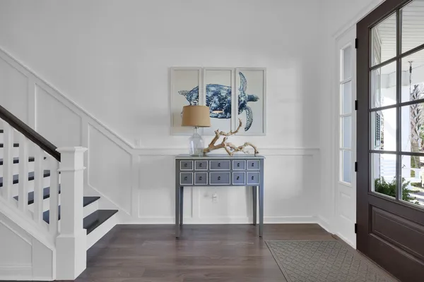 a view of a house with pool and porch