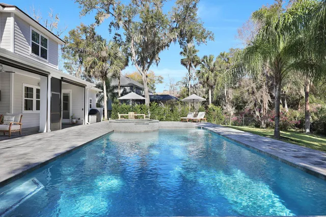 a view of a house with swimming pool