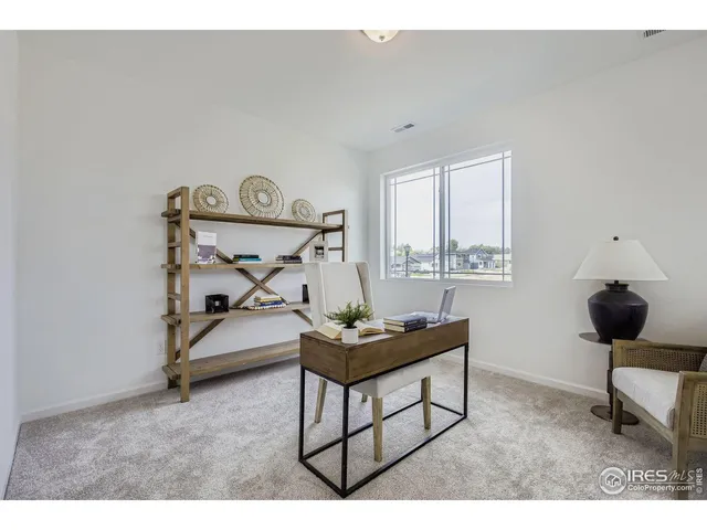 a bathroom with a sink toilet and mirror