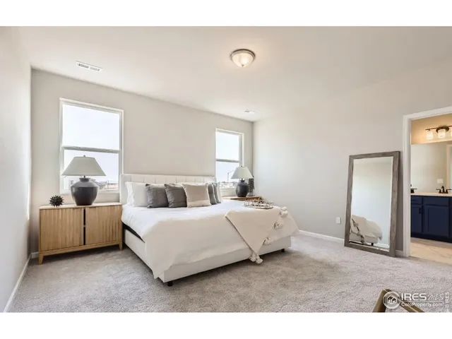 a living room with furniture and window