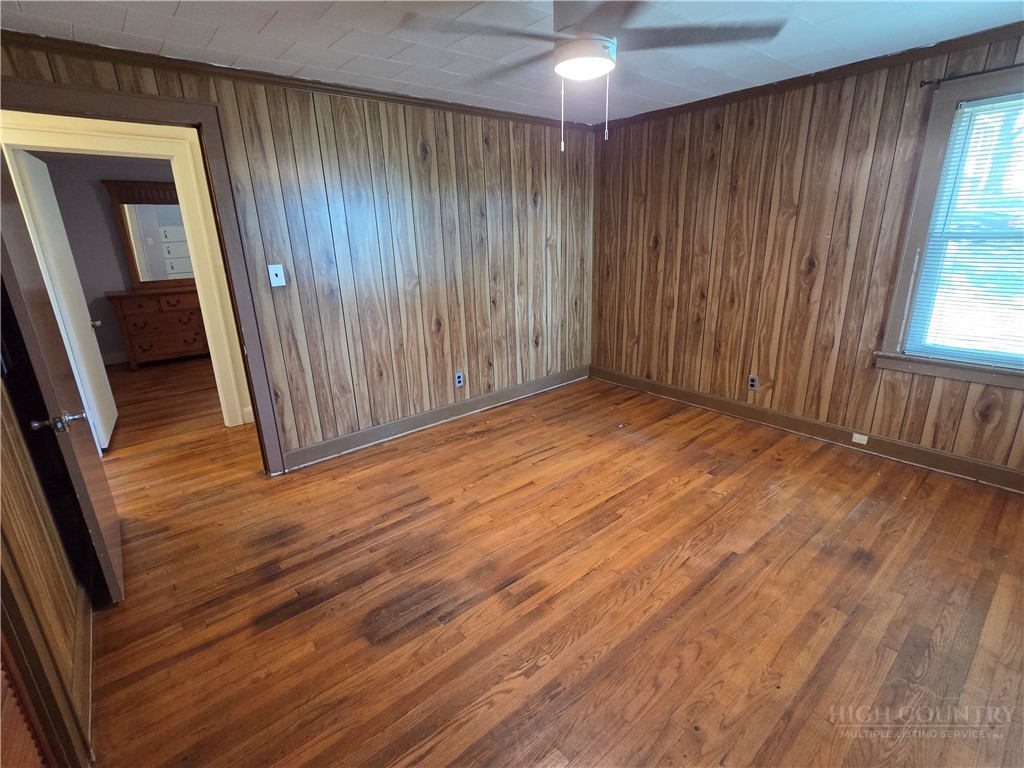 145 Black Oak Ridge Road Taylorsville, NC 28681 - Photo 28 of 39 wooden floor in an empty room with a window
