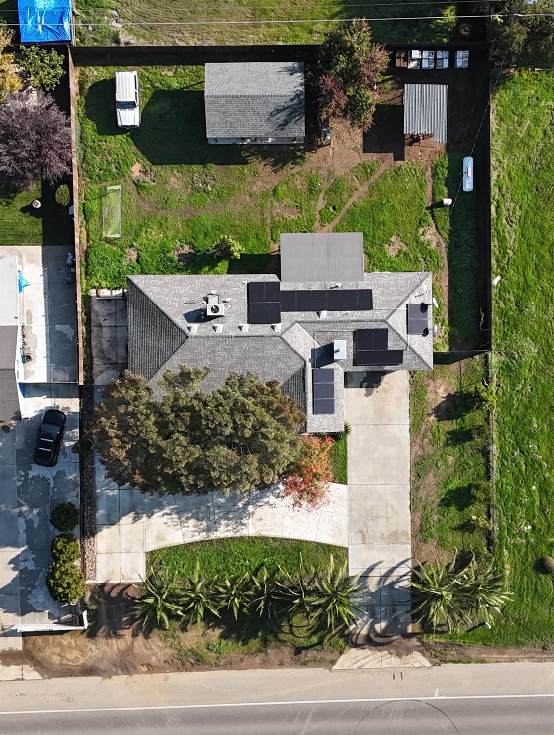 17405 Road 26 Madera, CA 93638 - Photo 4 of 4 an aerial view of a house with a yard