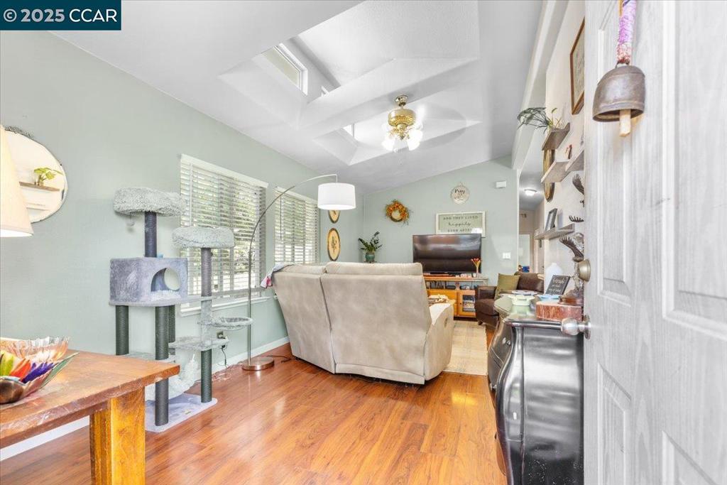 193 Maureen Circle Bay Point, CA 94565 - Photo 11 of 27 a living room with furniture and a wooden floor