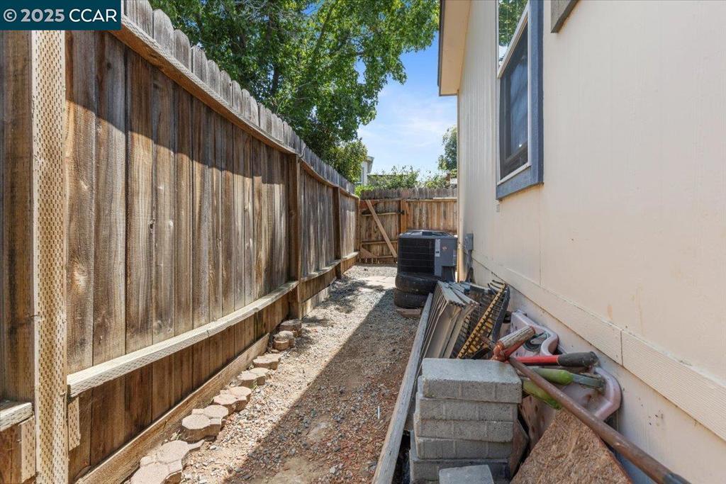 193 Maureen Circle Bay Point, CA 94565 - Photo 27 of 27 a view of a balcony with wooden floor and fence