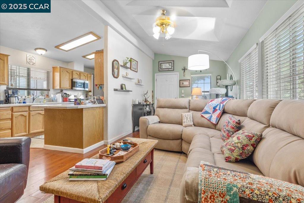 193 Maureen Circle Bay Point, CA 94565 - Photo 8 of 27 a living room with furniture and wooden floor