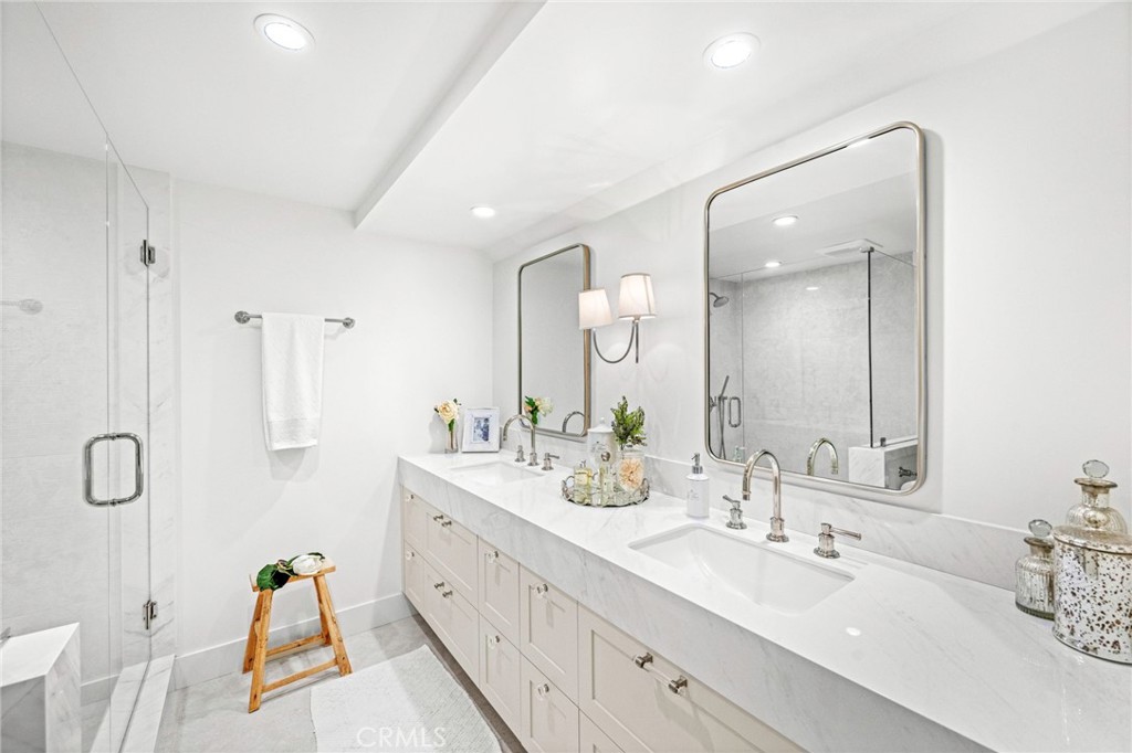 2933 Estancia San Clemente, CA 92673 - Photo 34 of 59 a bathroom with a double vanity sink and mirror
