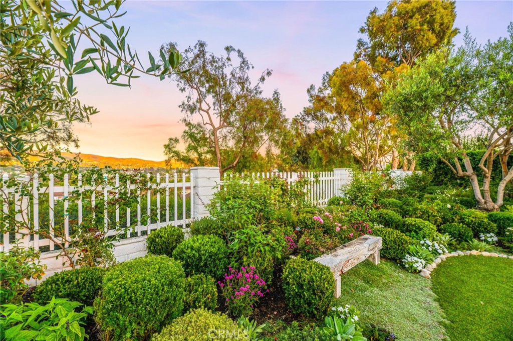 2933 Estancia San Clemente, CA 92673 - Photo 47 of 59 a view of a garden with a tree