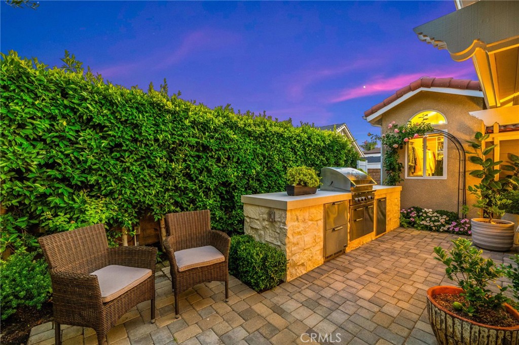2933 Estancia San Clemente, CA 92673 - Photo 53 of 59 a view of a chairs and table in the patio