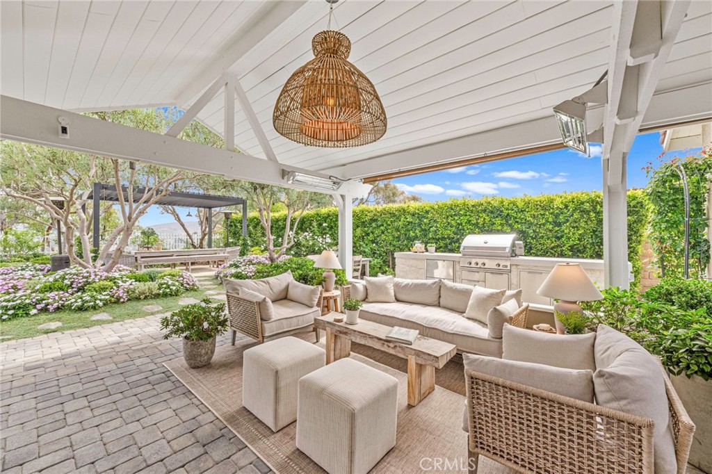 2933 Estancia San Clemente, CA 92673 - Photo 58 of 59 a living room with patio furniture and a large window