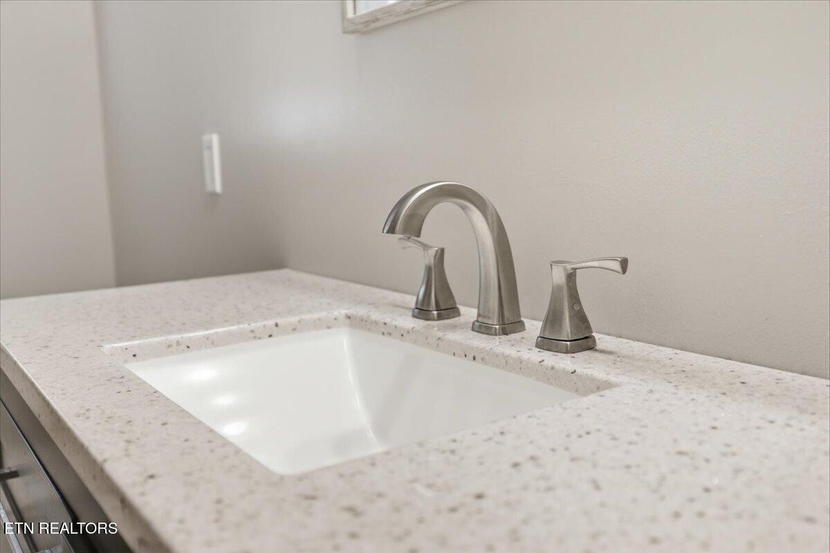 213 Lou Goddard Lane Greenback, TN 37742 - Photo 18 of 34 a close view of a sink a faucet and appliance in the kitchen