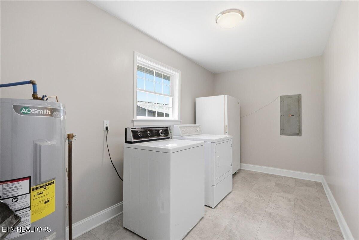 213 Lou Goddard Lane Greenback, TN 37742 - Photo 19 of 34 a utility room with dryer and washer