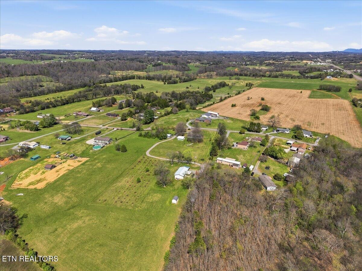 213 Lou Goddard Lane Greenback, TN 37742 - Photo 27 of 34 a view of a city with mountains in the background