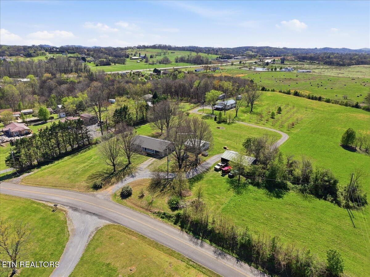 213 Lou Goddard Lane Greenback, TN 37742 - Photo 28 of 34 a view of a lake with a mountain