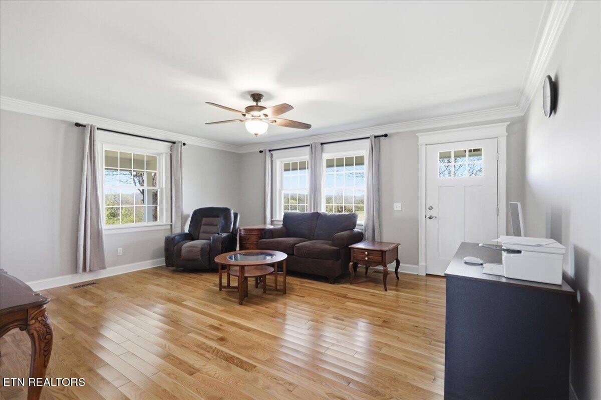 213 Lou Goddard Lane Greenback, TN 37742 - Photo 5 of 34 a living room with furniture and wooden floor