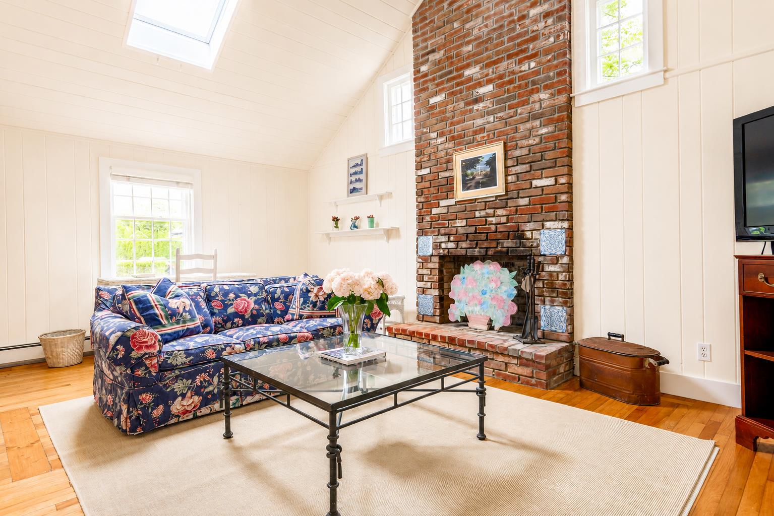 12 King Street Nantucket, MA 02554 - Photo 12 of 32 a living room with furniture and a large window