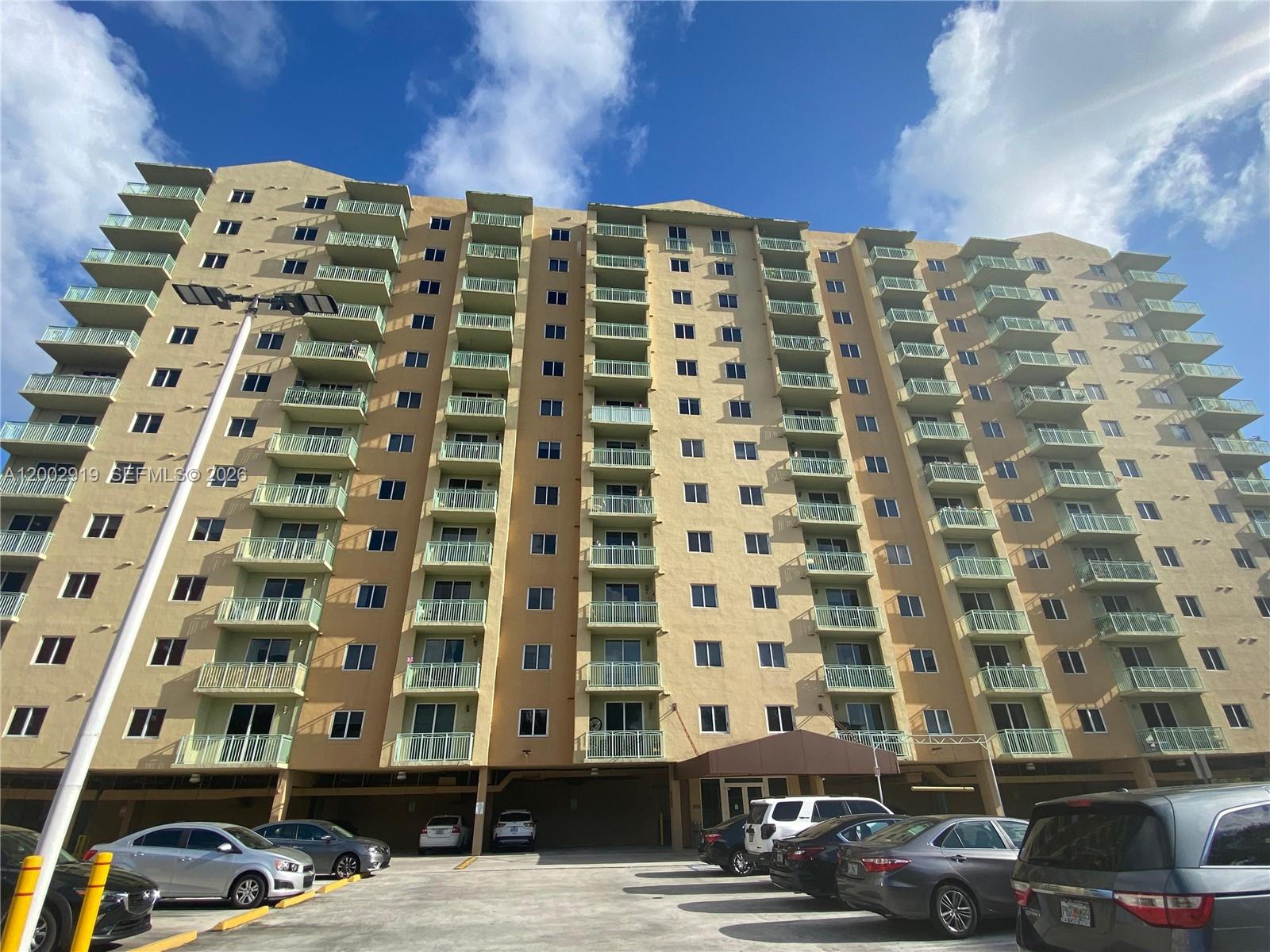 3500 Coral Way, Unit 505 Miami, FL 33145 - Photo 1 of 18 a view of a building with parking space