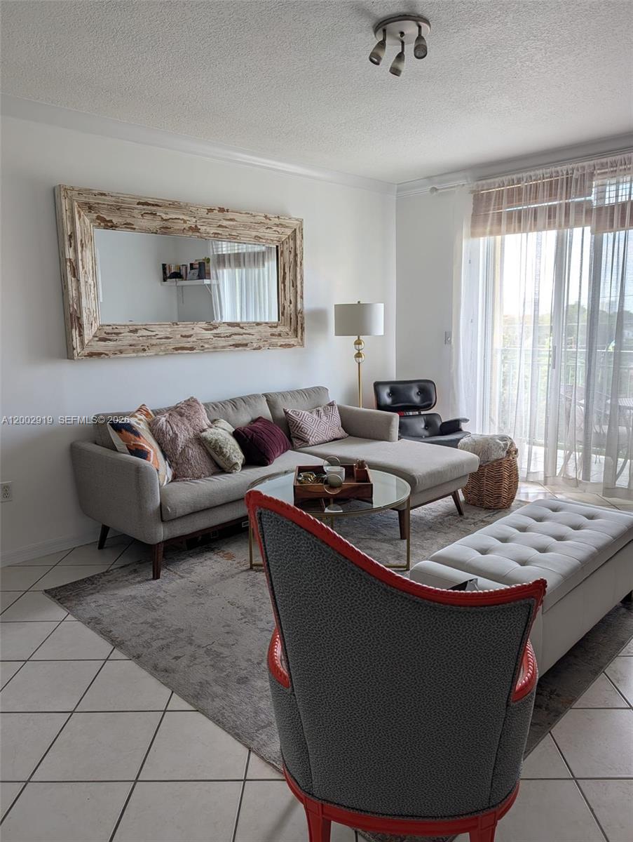 3500 Coral Way, Unit 505 Miami, FL 33145 - Photo 11 of 18 a living room with furniture and a window