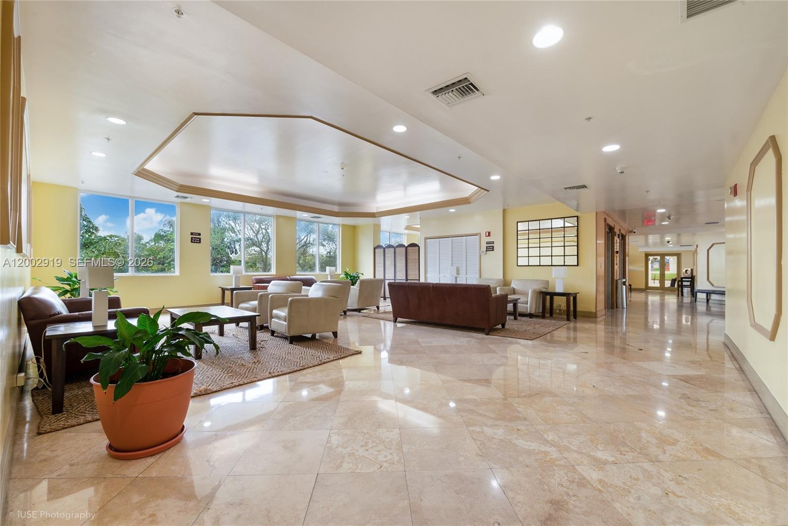 3500 Coral Way, Unit 505 Miami, FL 33145 - Photo 2 of 18 a living room with furniture and a potted plant