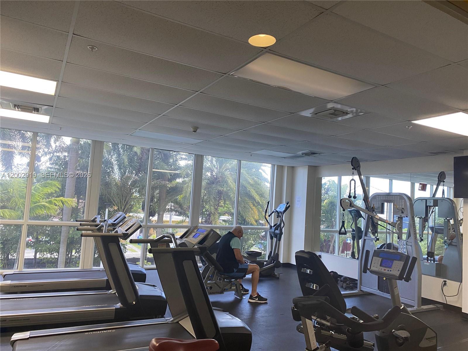 3500 Coral Way, Unit 505 Miami, FL 33145 - Photo 5 of 18 a view of a room with gym equipment