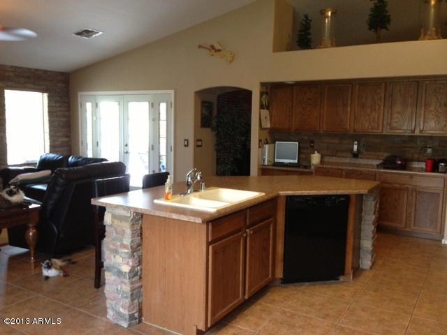 8323 North Citrus Road Waddell, AZ 85355 - Photo 6 of 31 family room 2