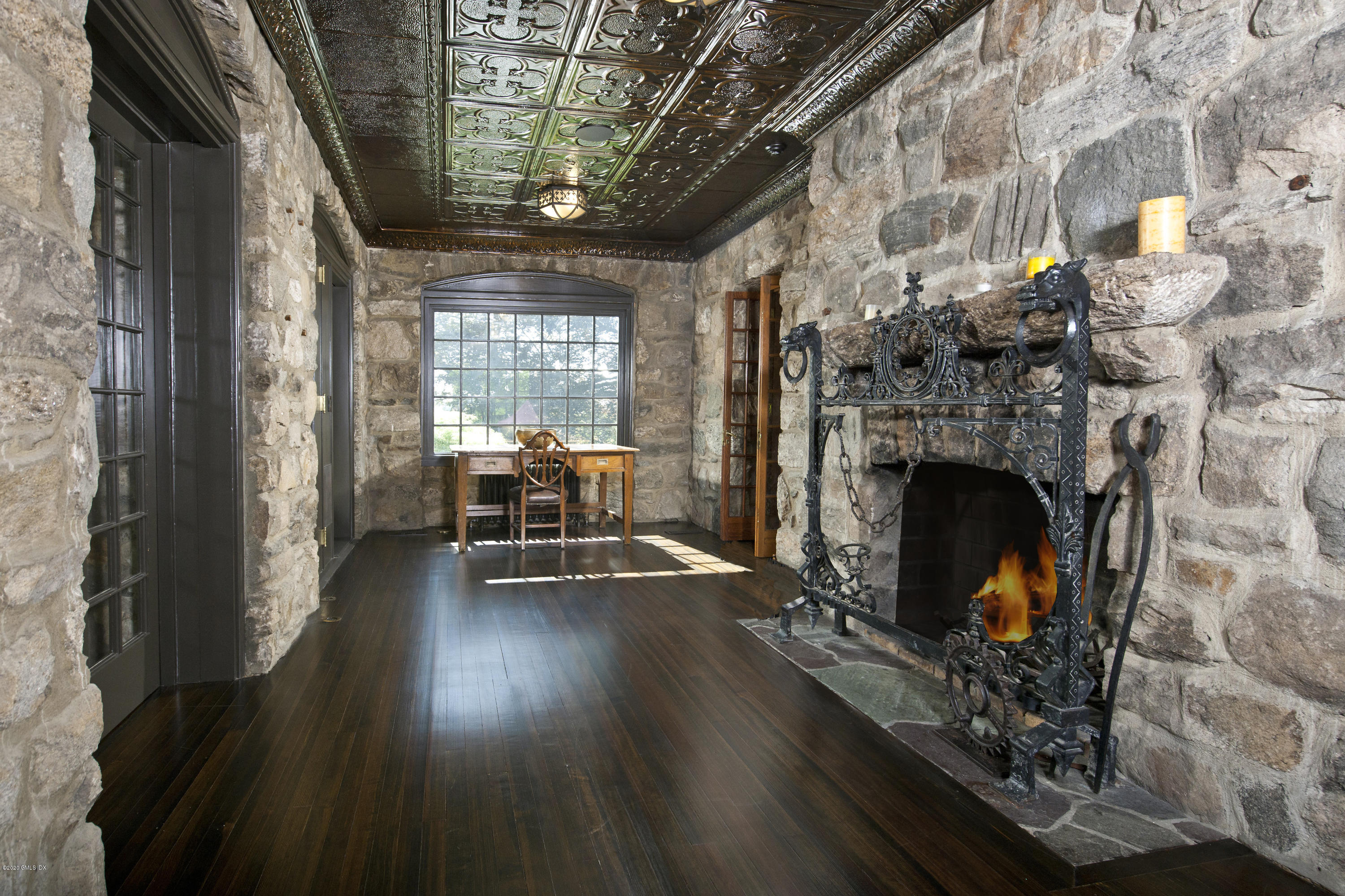 47 Carriglea Drive Riverside, CT 06878 - Photo 11 of 23 a living room with furniture and a fireplace