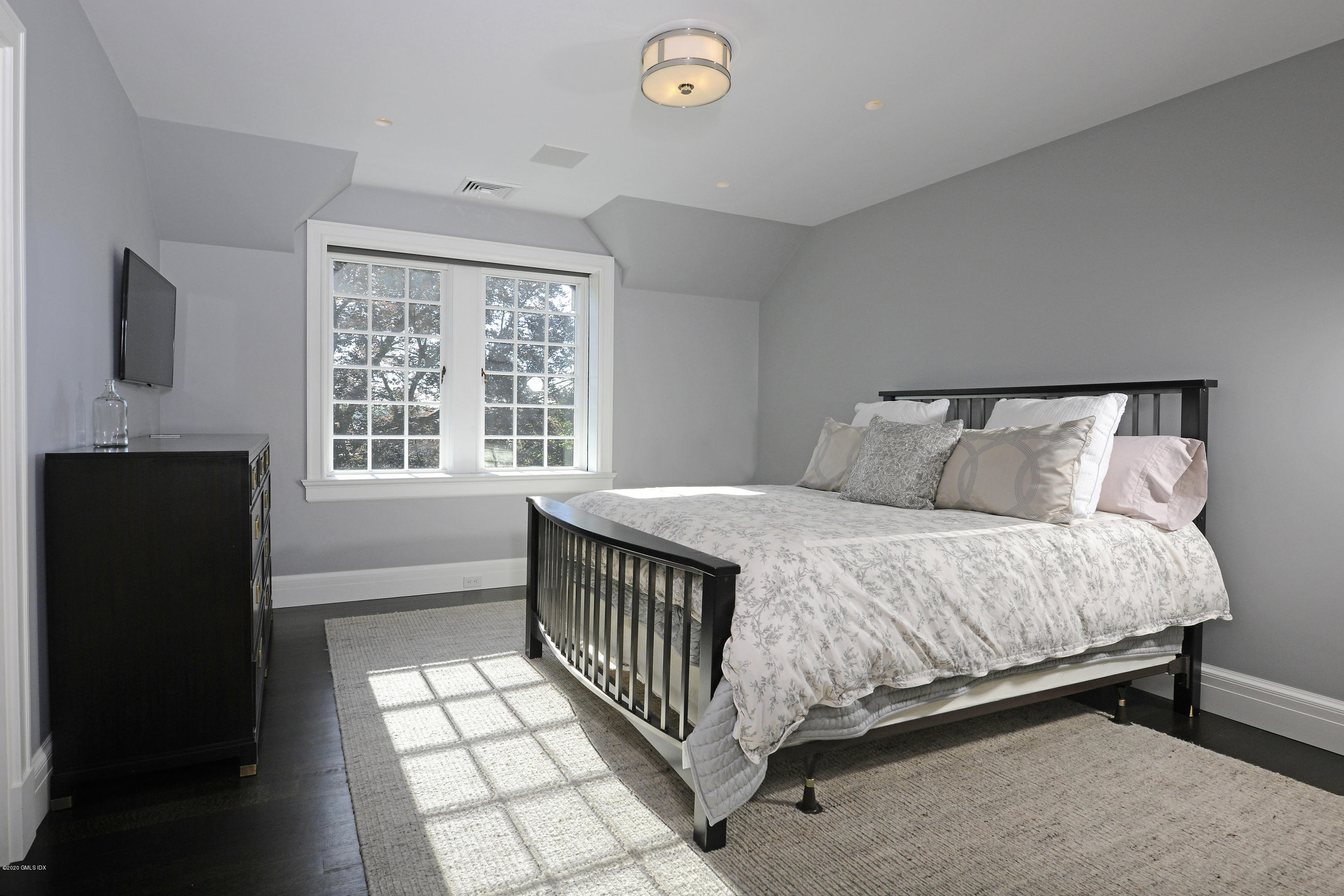 47 Carriglea Drive Riverside, CT 06878 - Photo 17 of 23 a bedroom with a bed and a window