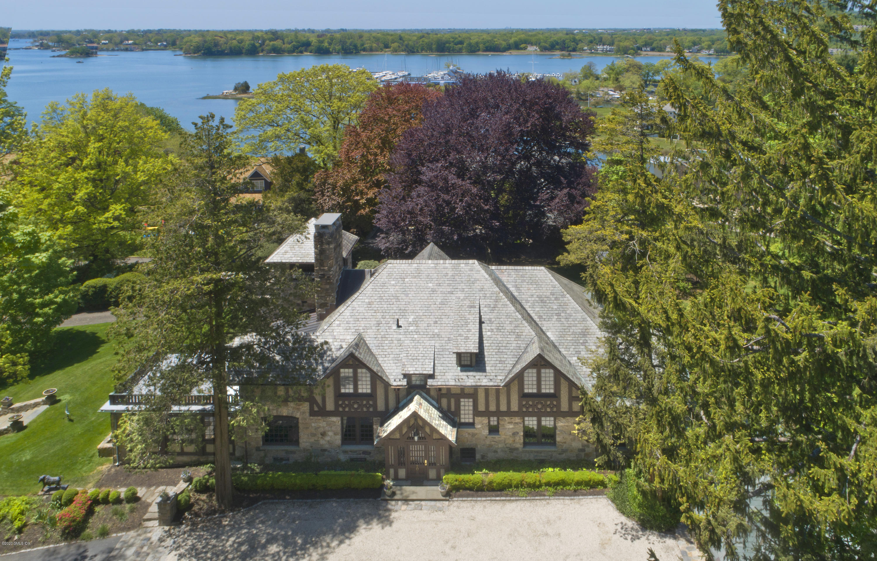 47 Carriglea Drive Riverside, CT 06878 - Photo 2 of 23 an aerial view of a house with a lake view