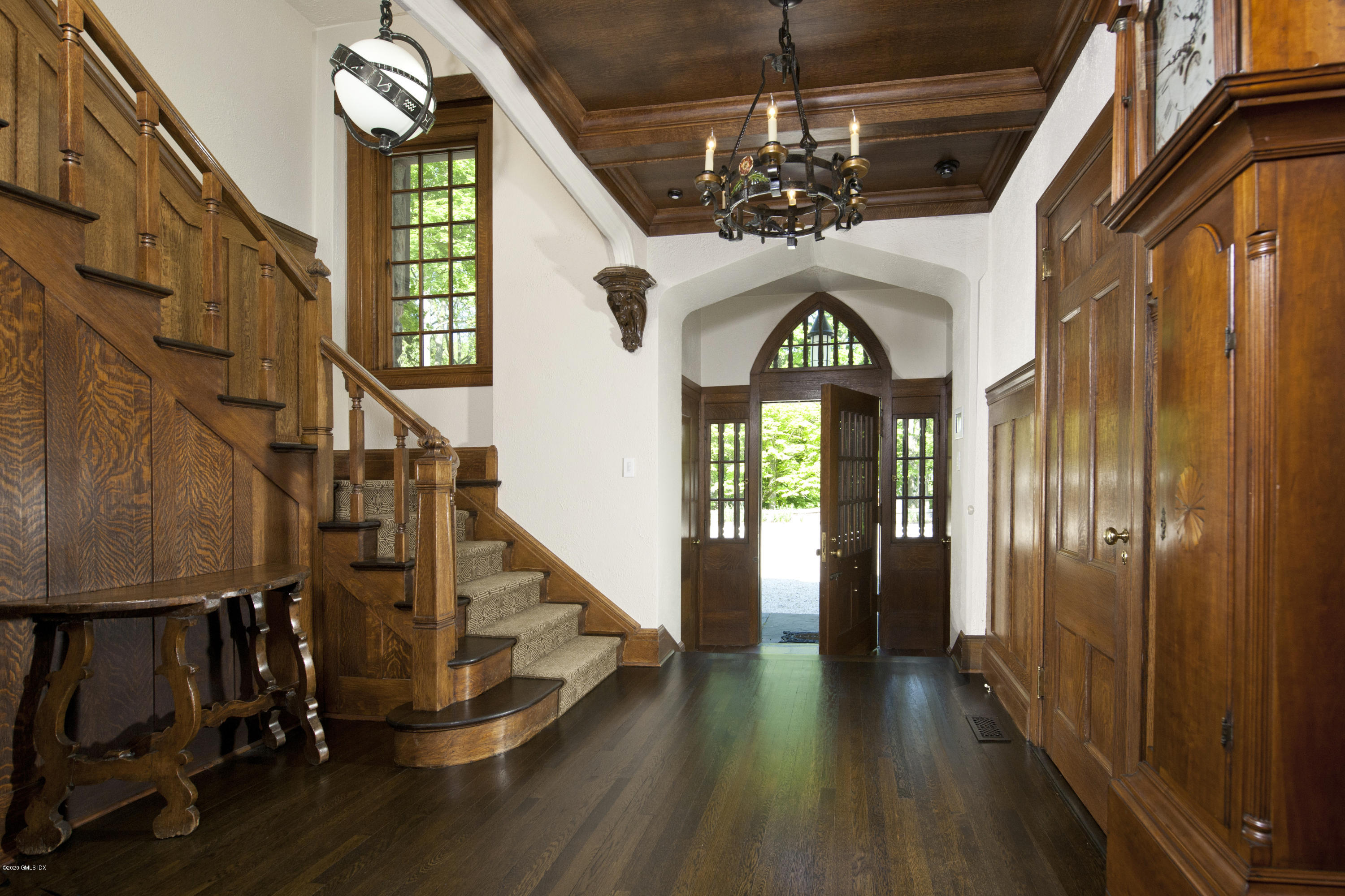 47 Carriglea Drive Riverside, CT 06878 - Photo 4 of 23 a view of an entryway wooden floor and door