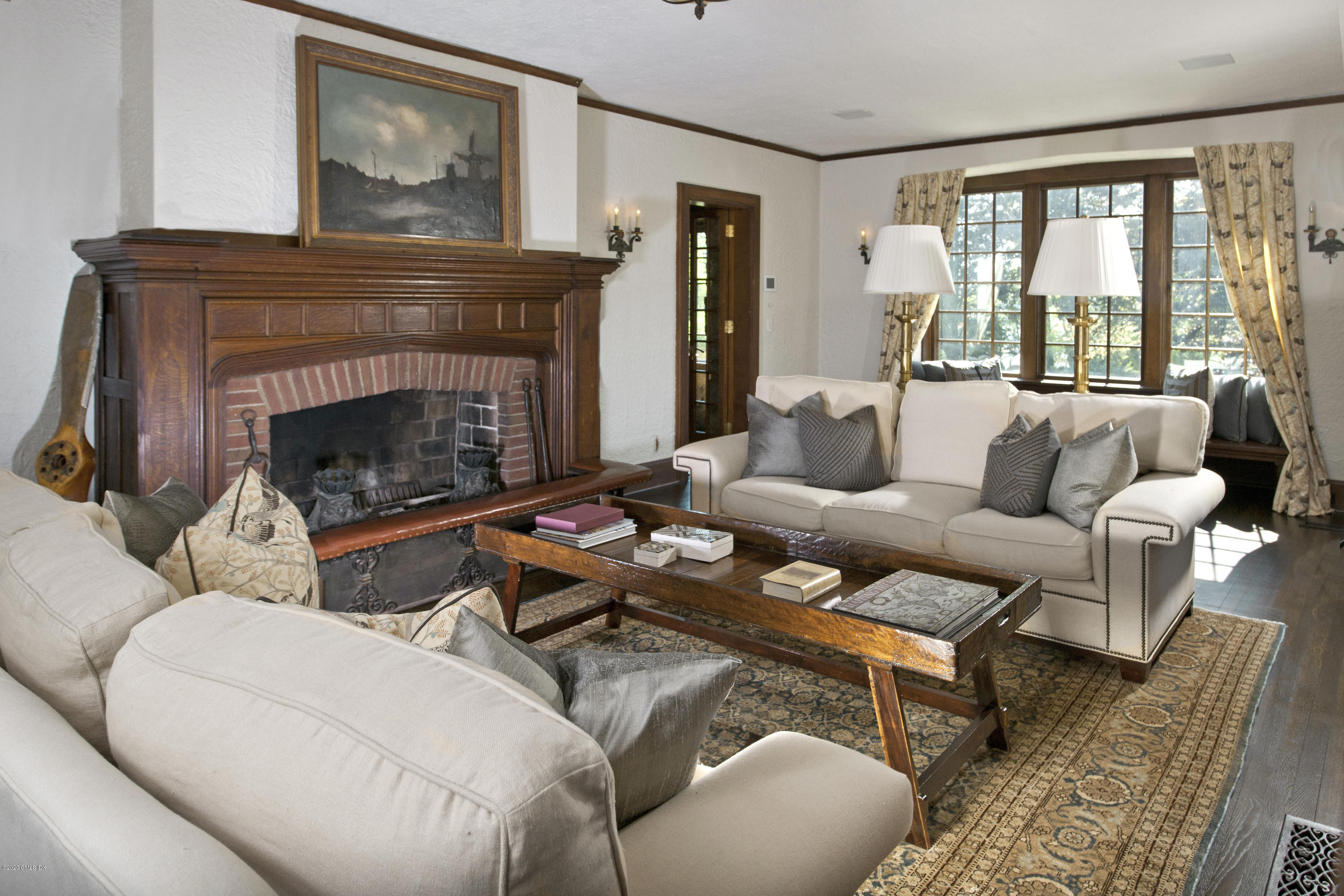 47 Carriglea Drive Riverside, CT 06878 - Photo 5 of 23 a living room with furniture and a fireplace