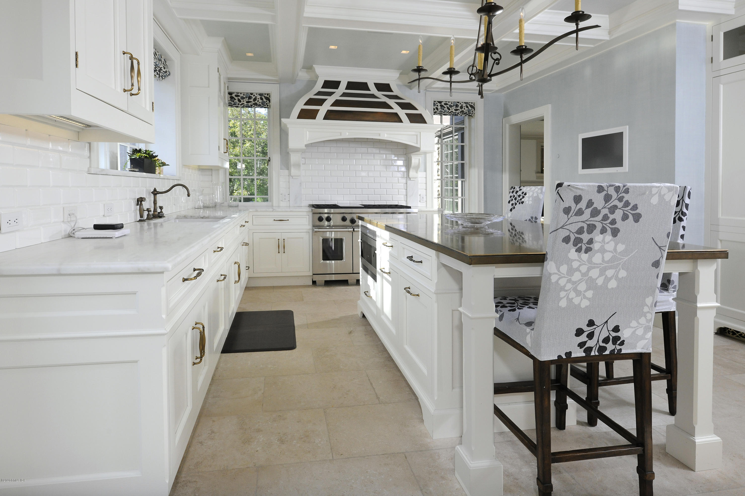 47 Carriglea Drive Riverside, CT 06878 - Photo 8 of 23 a kitchen with stainless steel appliances granite countertop a sink stove and refrigerator