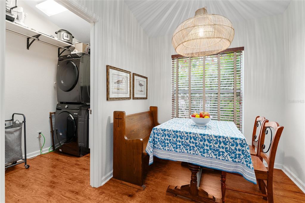 4080 Southwest 47th Court Ocala, FL 34474 - Photo 12 of 50 a bedroom with a bed and a chandelier