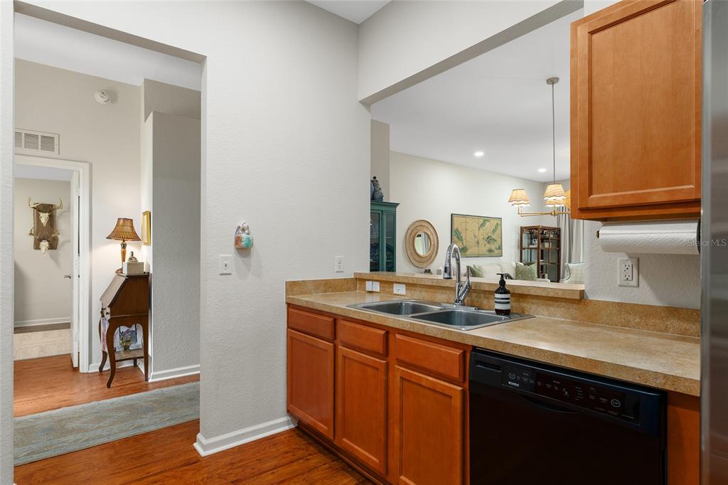 4080 Southwest 47th Court Ocala, FL 34474 - Photo 16 of 50 a kitchen with a sink and a wooden floor