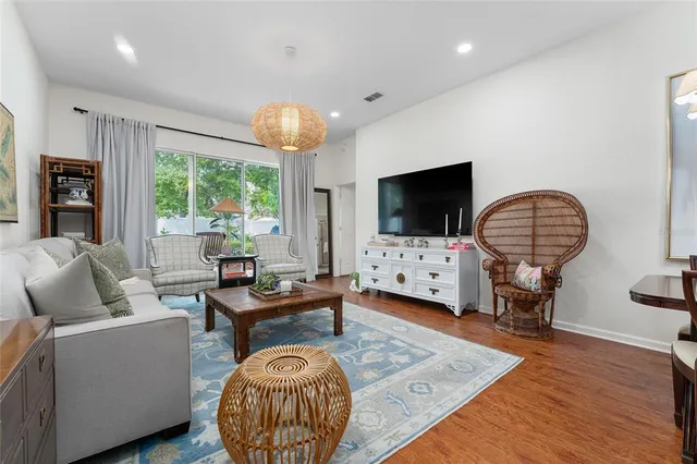 a living room with furniture and a table