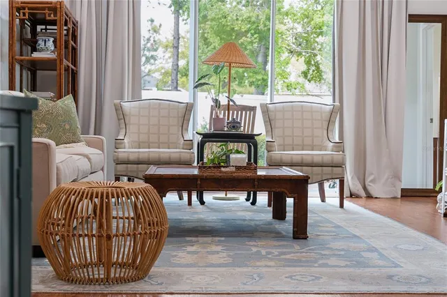 a living room with furniture and a window