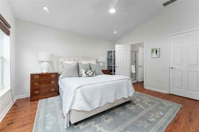 a bedroom with a bed and a dresser