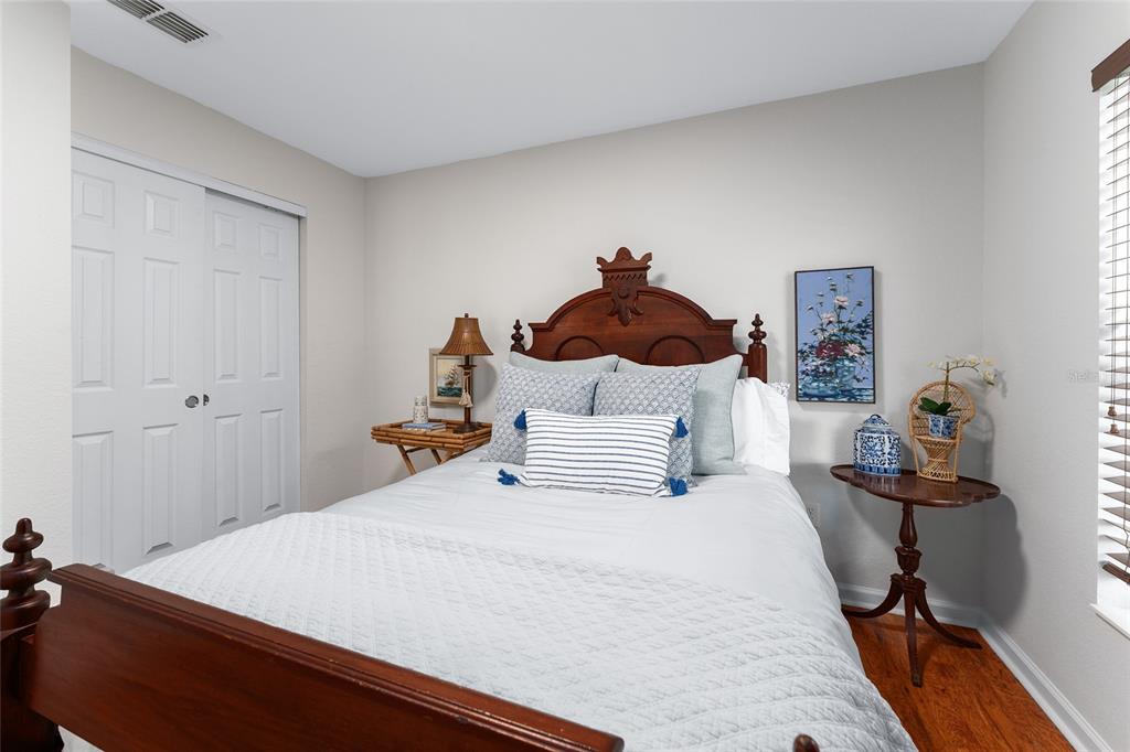 4080 Southwest 47th Court Ocala, FL 34474 - Photo 37 of 50 a bedroom with a bed and a dresser