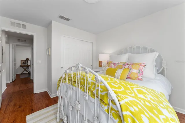 a view of backyard with seating space and trees