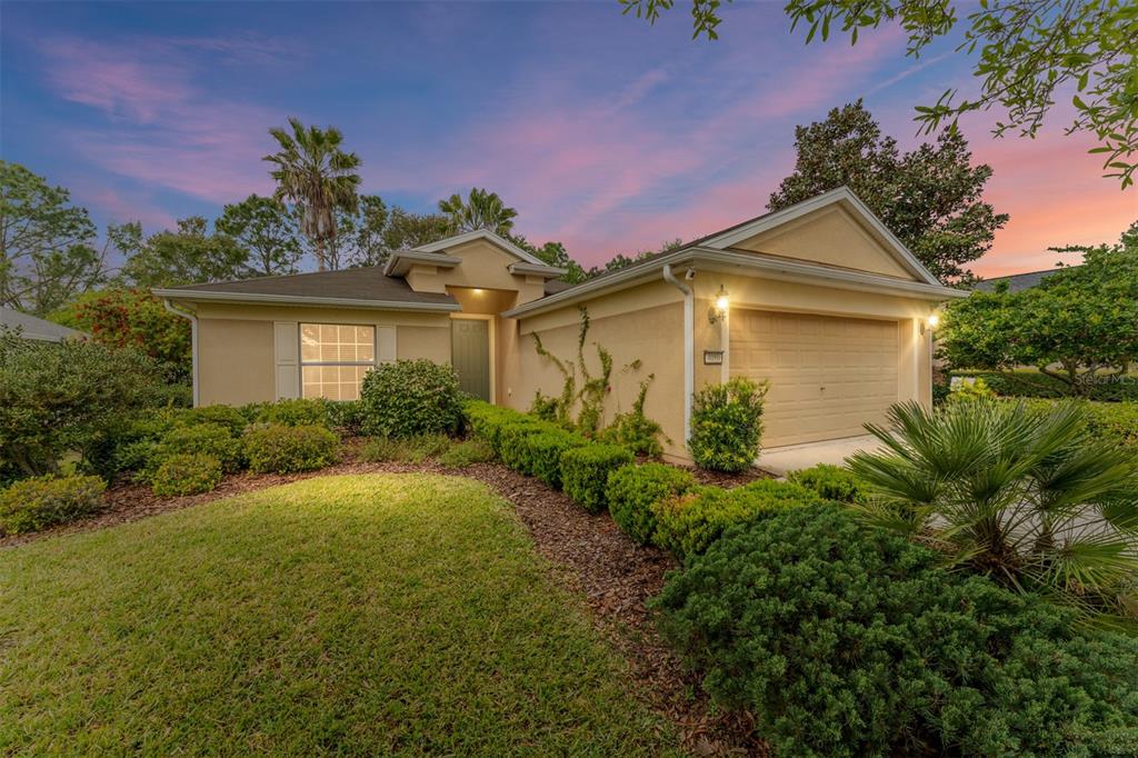 4080 Southwest 47th Court Ocala, FL 34474 - Photo 50 of 50 a front view of a house with garden